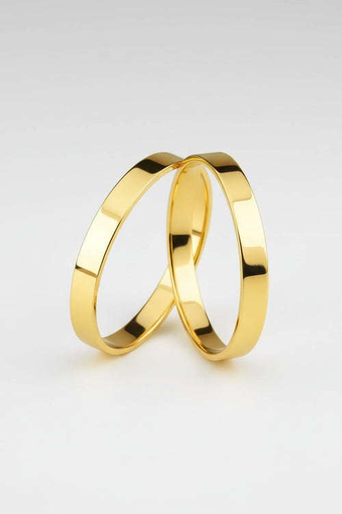 Par de alianças Ouro 18K Classic, design reto, acabamento polido, elegante.